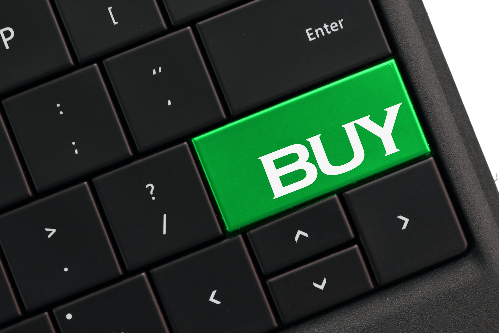 Buy - computer keyboard with green BUY button. Buying purchasing shopping online concept